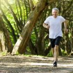 running man wearing hearing aids 